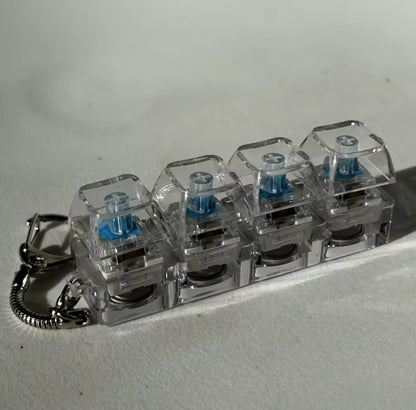 Mini Teclado para aliviar el estrés, llavero Fidget